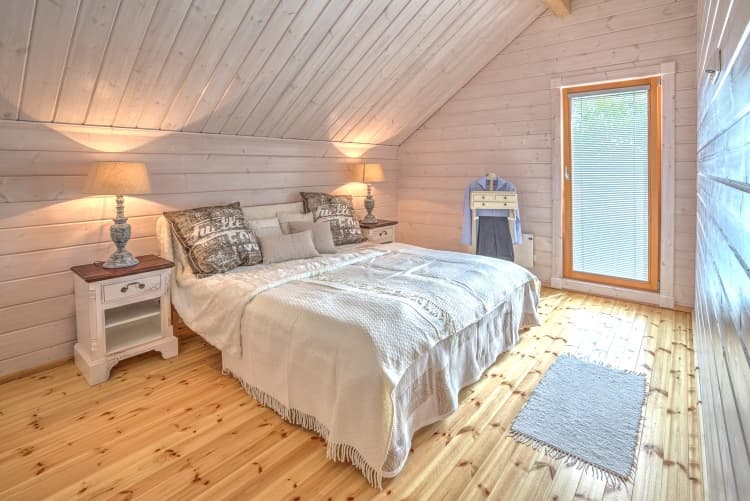 KONTIO log homes — bedroom in pleasant colours