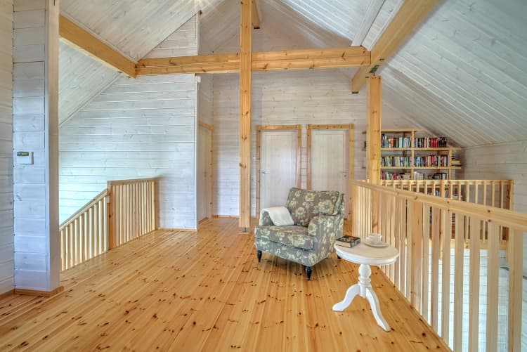 KONTIO log homes — gallery for quiet moments with a book