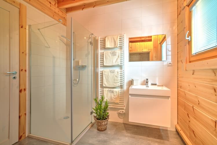 KONTIO log homes — lower bathroom with KONTIO sauna