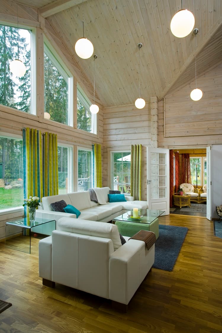 KONTIO Finnish log homes — living room with a view of the garden 1