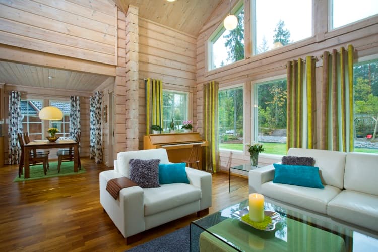 KONTIO Finnish log homes — living room with dining area