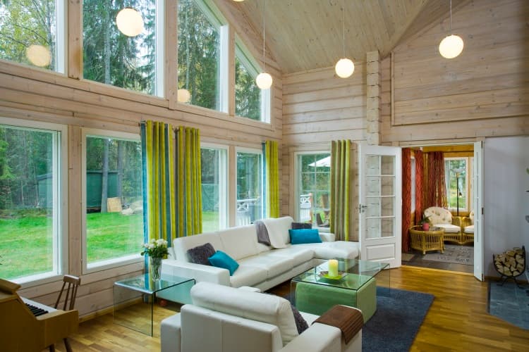 KONTIO Finnish log homes — living room with a view of the garden 2