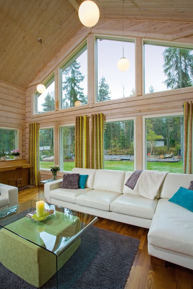 KONTIO Finnish log homes — living room with a view of the garden