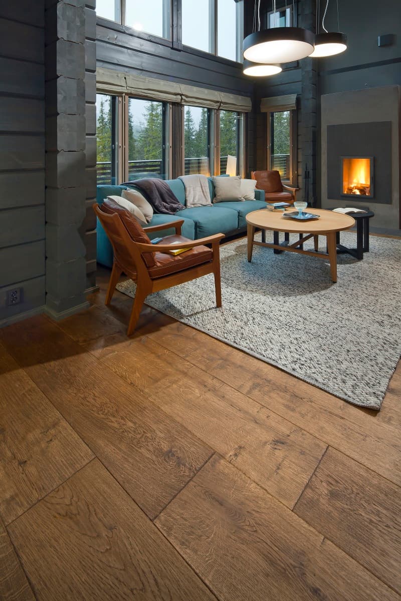Halle lighting is never missing from the living room of a KONTIO log home
