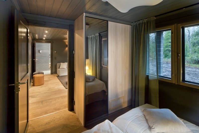Luxury KONTIO log home, ground-floor bedroom