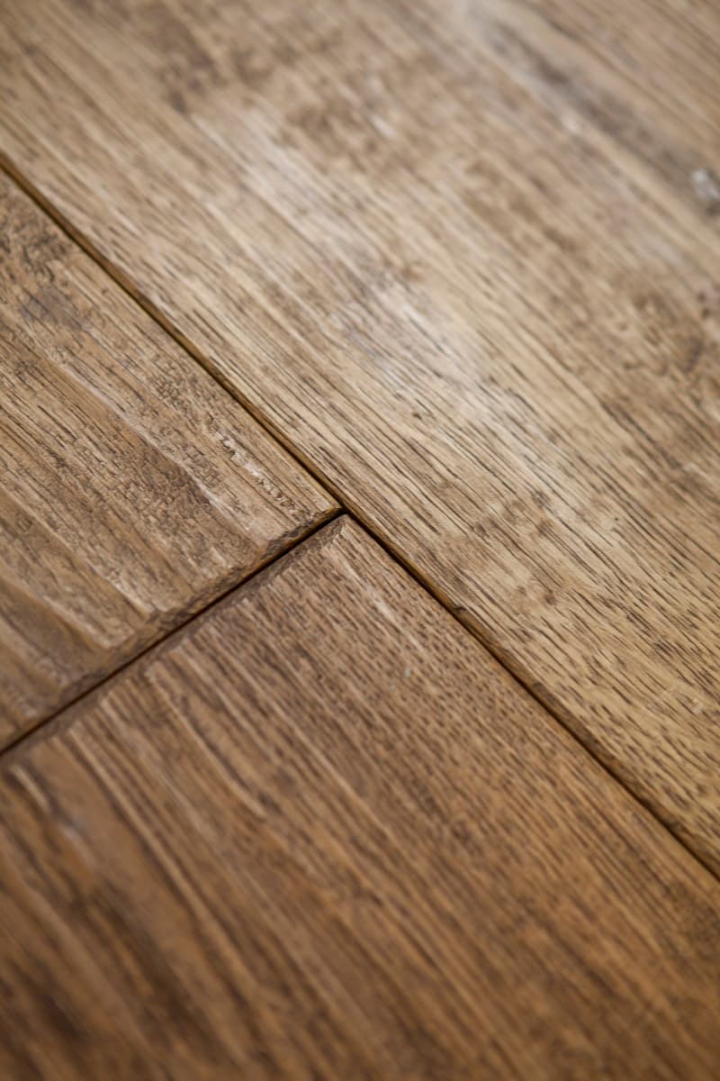 Detail of distressed timber flooring — KONTIO log homes