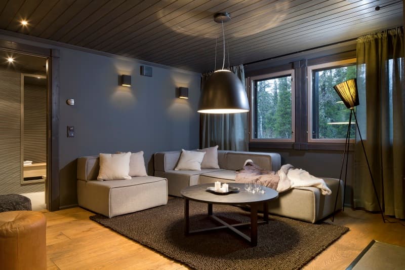 Living room in a KONTIO home with Artemide lighting