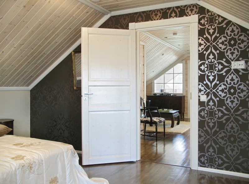Bedroom in a KONTIO log home