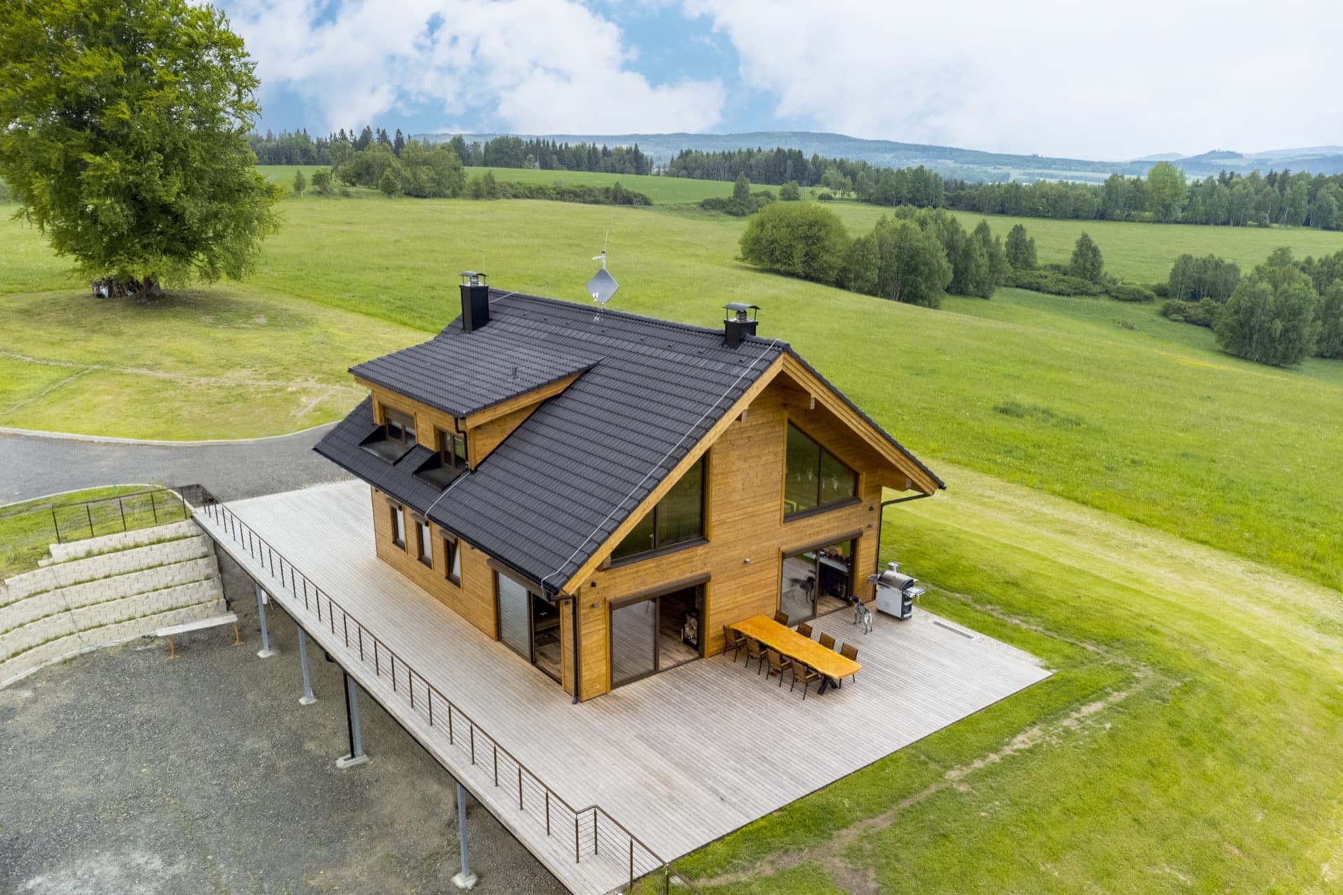 KONTIO timber homes — modern house with basement — aerial exterior view