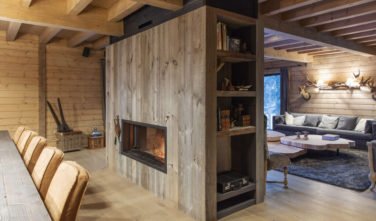 Dřevostavby Kontio dům v lese obývací pokoj
